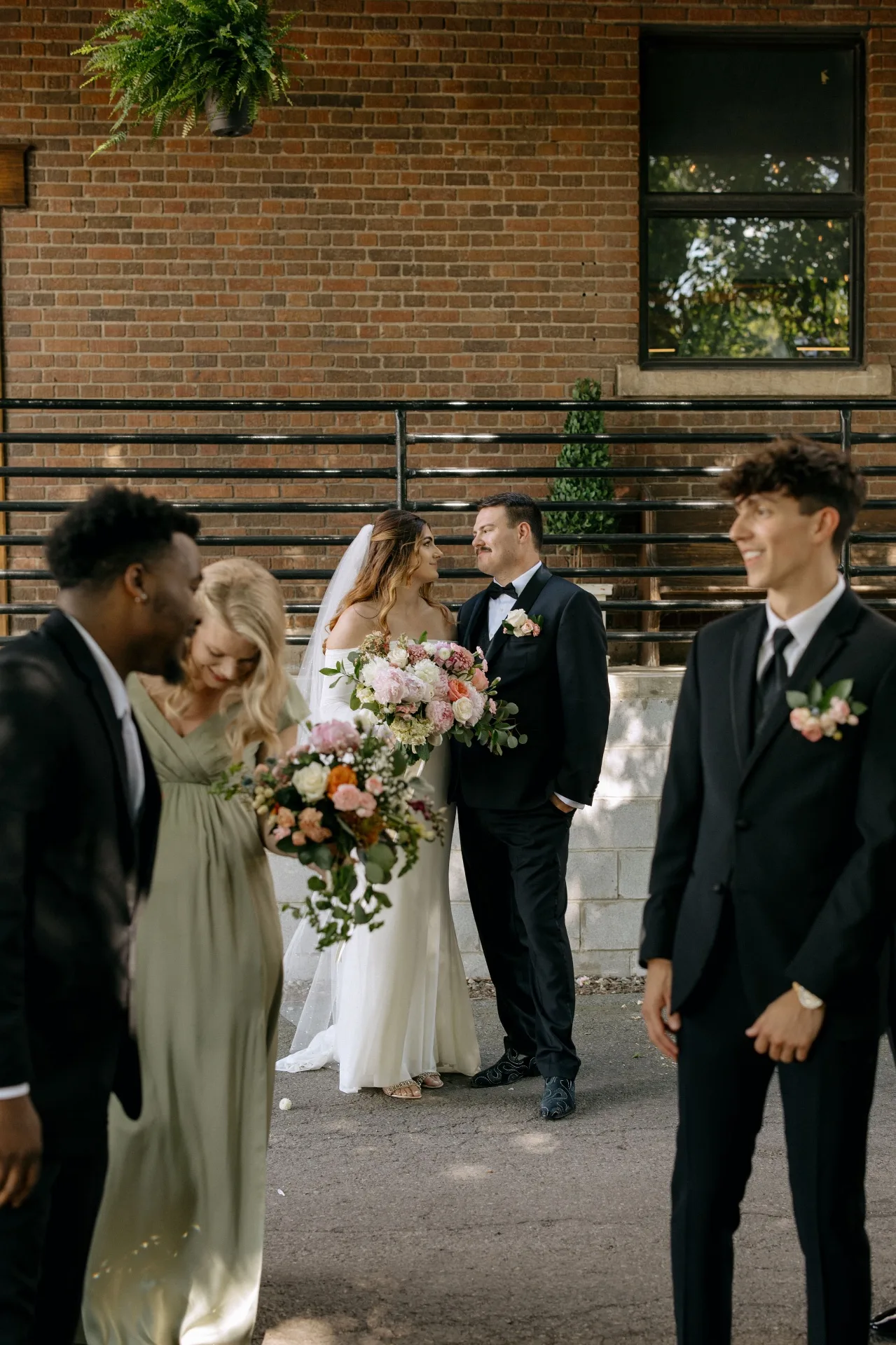 Wedding party portraits outside Urban501